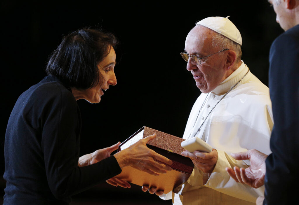 Dr. Gianna Emanuela Molla, daughter of St. Gianna Beretta Molla, greets Pope Francis at the Festival of Families during the World Meeting of Families in Philadelphia Sept. 26. (CNS photo/Paul Haring)