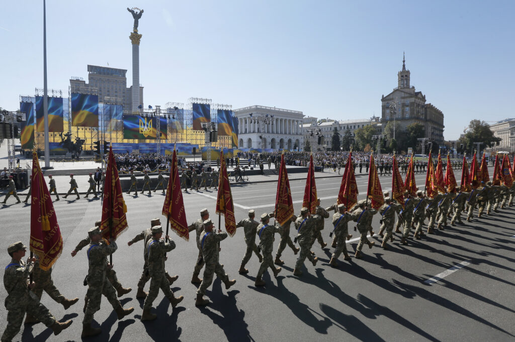 Ukrainian servicemen march with flags during the 24th anniversary of Ukraine's independence from the Soviet Union in Kiev, Aug. 24. (CNS photo/Sergey Dolzhenko, EPA) 