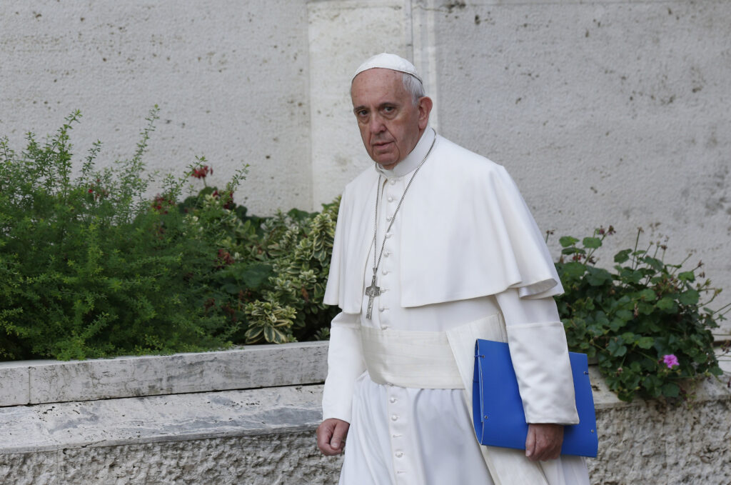 Pope Francis arrives for the morning session of the Synod of Bishops on the family at the Vatican Oct. 6. (CNS photo/Paul Haring)