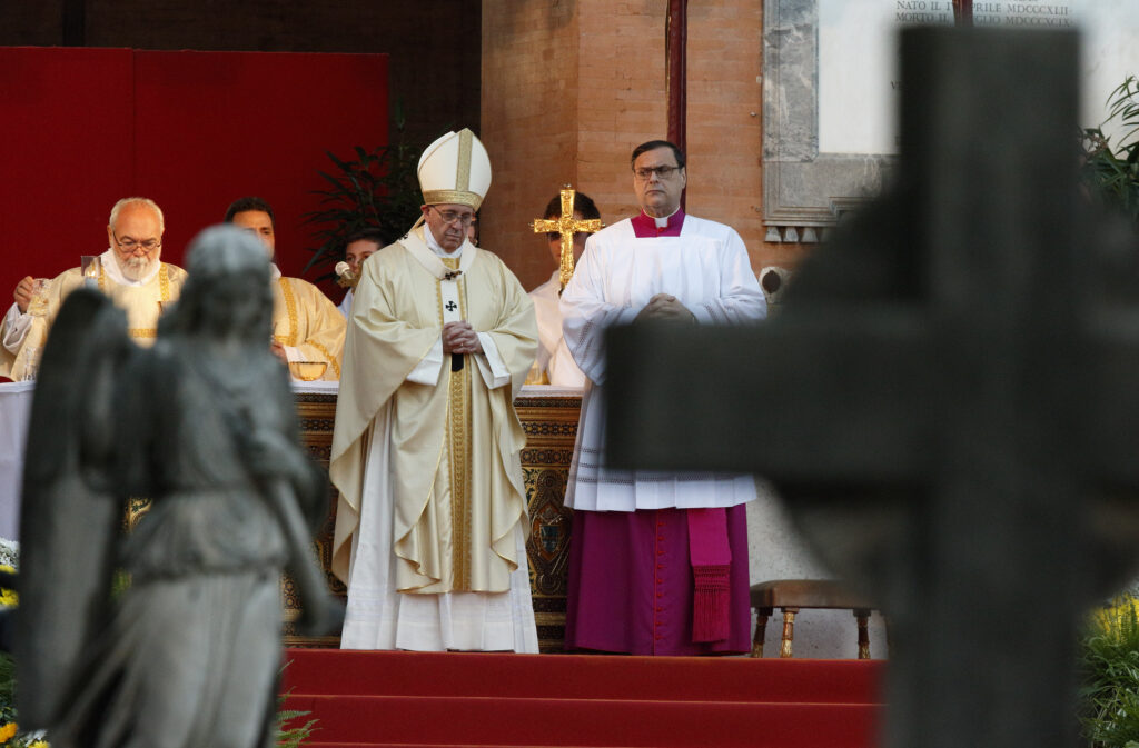 Pope Francis celebrates Mass in Verano cemetery in Rome Nov. 1, the feast of All Saints. (CNS photo/Paul Haring)