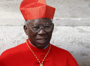 Nigerian Cardinal Francis Arinze, retired prefect of the Congregation for Divine Worship and the Sacraments, is pictured outside St. Peter's Basilica after the closing Mass of the Synod of Bishops on the family at the Vatican Oct. 25. Cardinal Arinze spoke at a Nov. 5 Vatican conference on "Gaudium et Spes," the Second Vatican Council document concerning the church in the modern world. (CNS photo/Paul Haring)