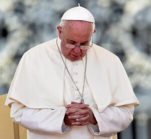 Pope Francis prays during his Aug. 26 general audience in St. Peter's Square at the Vatican. Pope Francis says he wants the Year of Mercy to usher in a "revolution of tenderness." (CNS photo/Ettore Ferrari, EPA) 